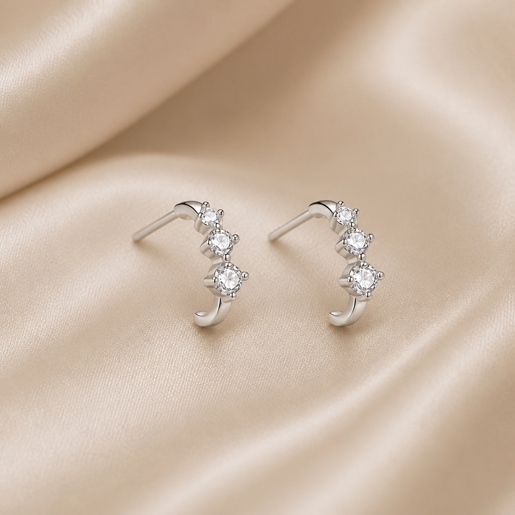 White gold earrings with small cubic zirconia stones