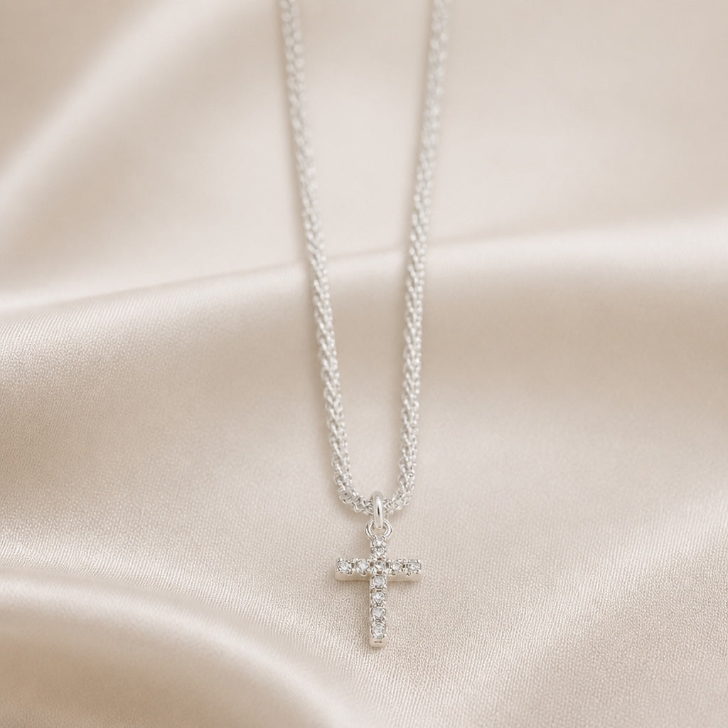 White gold necklace with a cross pendant and zirconia