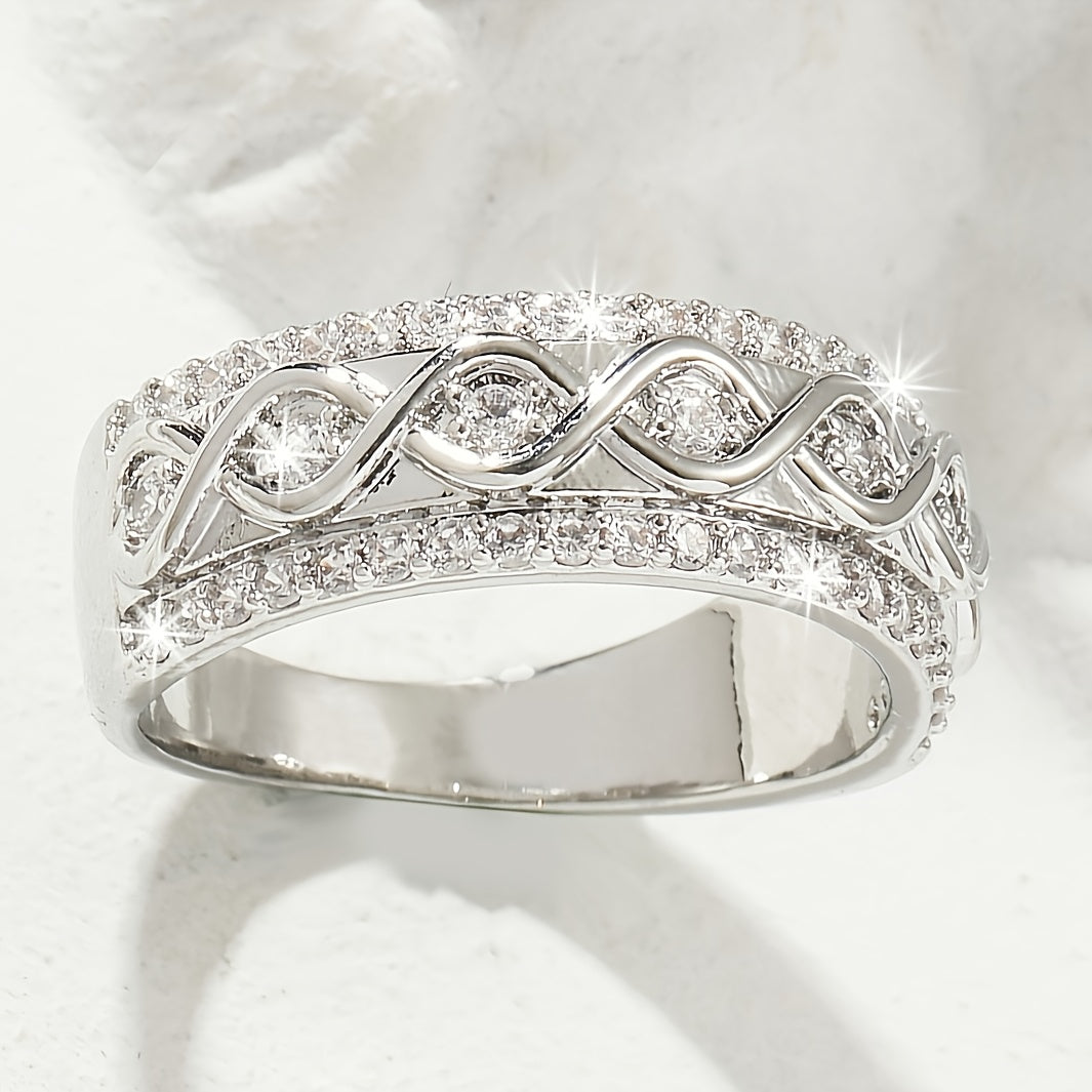 White gold ring with a double row of cubic zirc