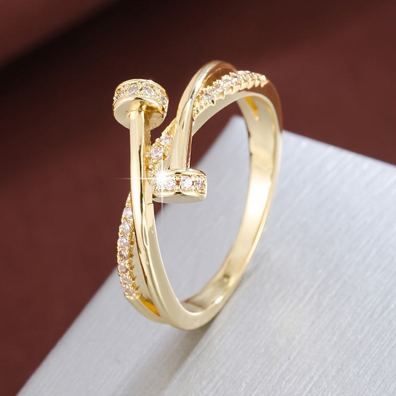 White gold crossover ring with cubic zirconia
