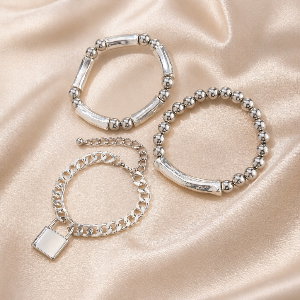 Collection of White Gold Pearl Bracelets with Punk-Style Clasps