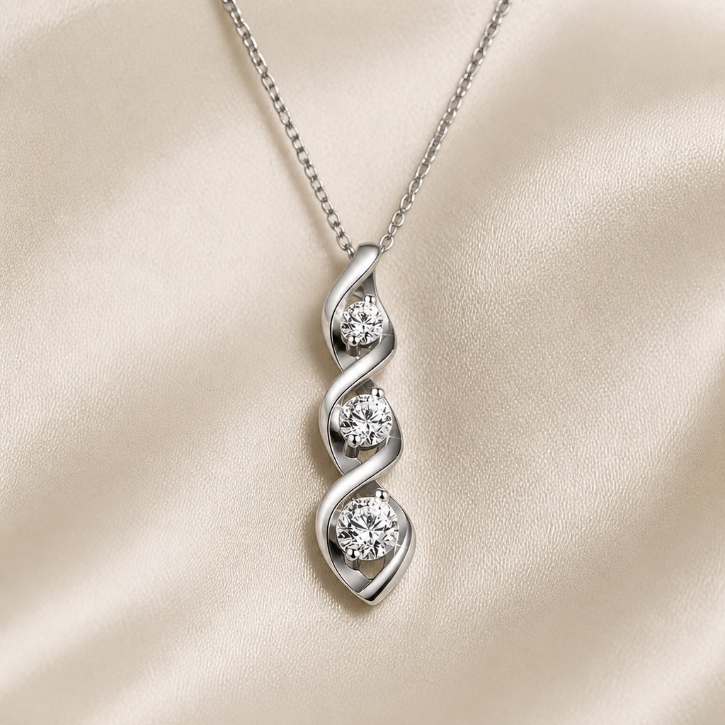 White gold necklace with an infinity-shaped pendant and cubic zirconia