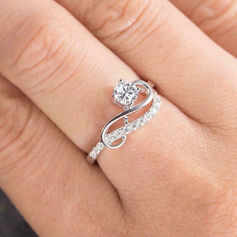 Infinite Wave ring in moissanite and white gold