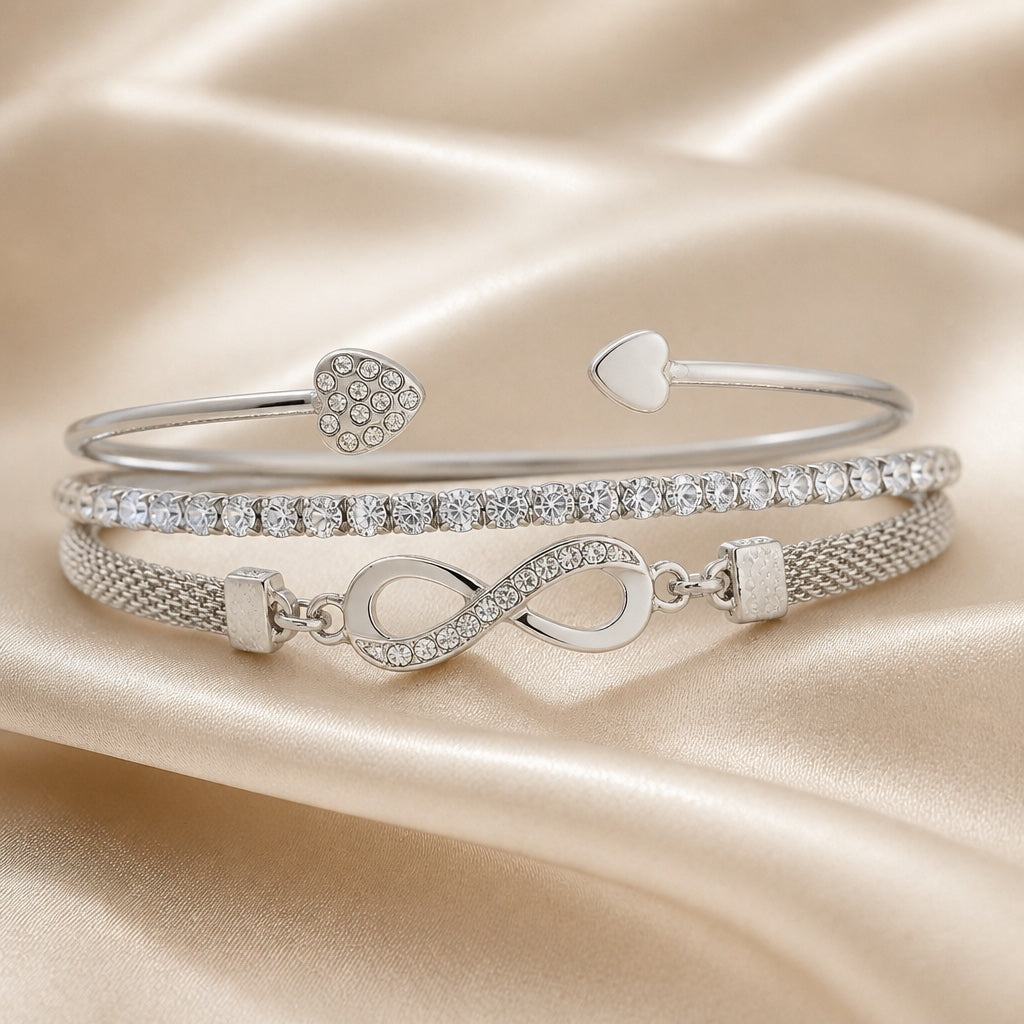 White gold rhinestone bracelet collection with infinity motif
