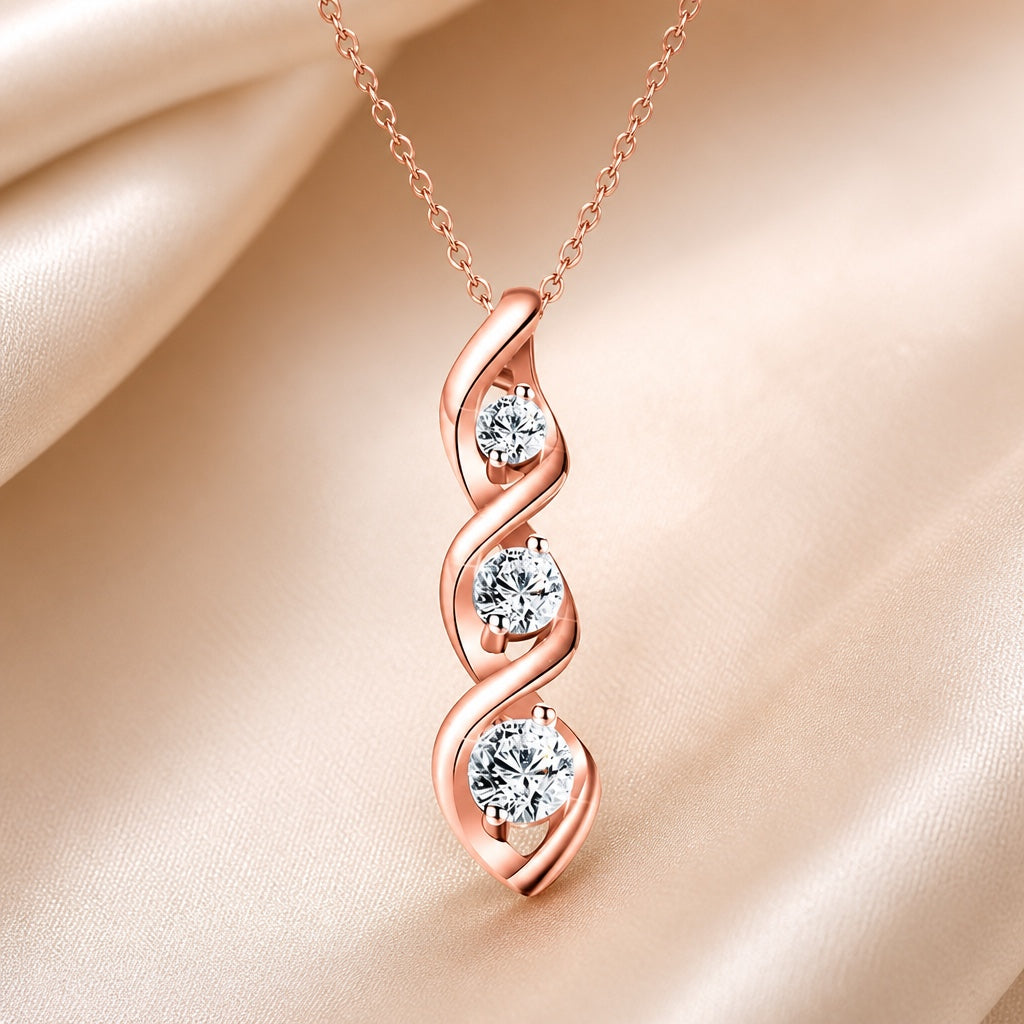 White gold necklace with an infinity-shaped pendant and cubic zirconia