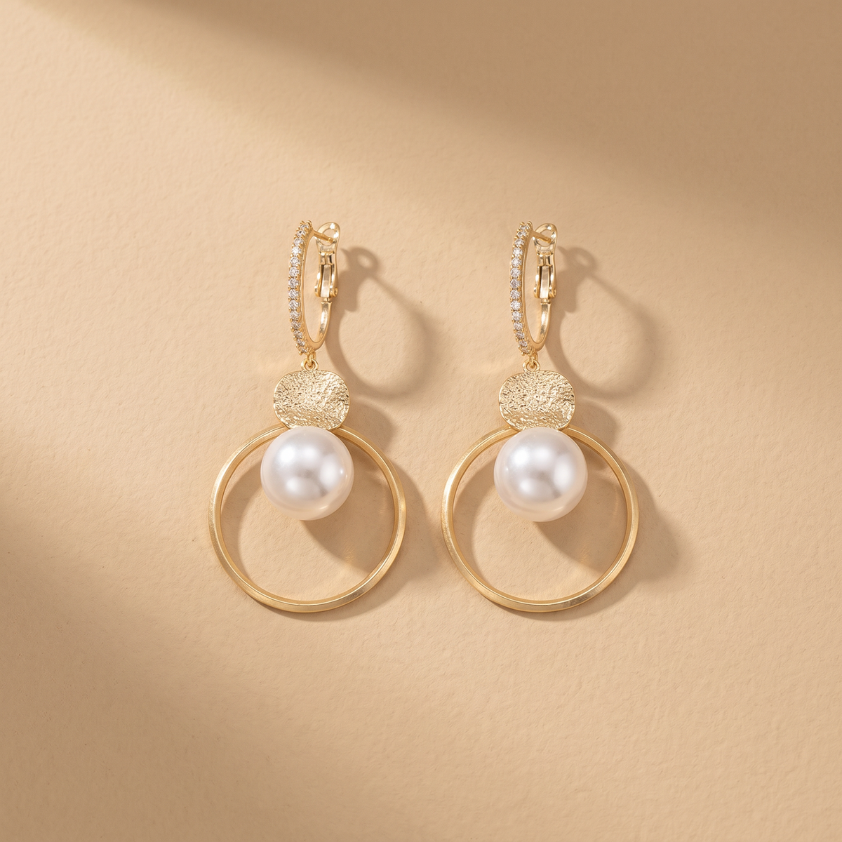 Earrings with Cultured Pearls and Embezzled Balls